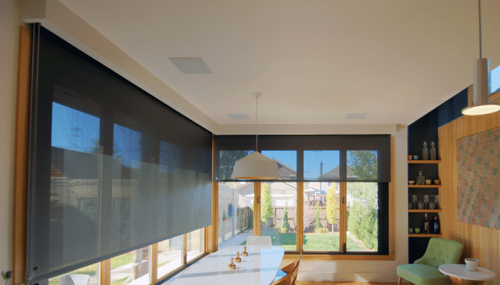 Roller and solar shades in sunroom